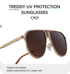Detailed view of pilot sunglasses with gold metal frame and striped bridge accents