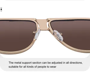 Macro detail of adjustable metal nose pads and golden bridge on aviator sunglasses