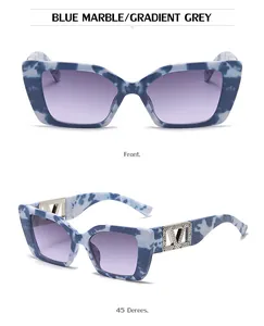 Detail view of blue marble cat eye sunglasses with silver V logo and crystal accents