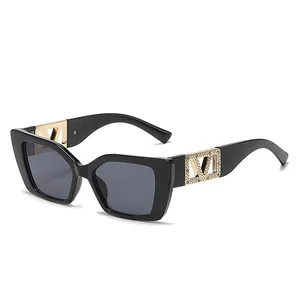 Fashionable square black sunglasses with luxury gold V-shaped crystal encrusted temples