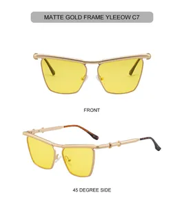 Detail view of matte gold metal frame sunglasses with yellow lenses and unique top bar