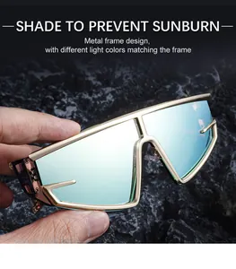 Detailed view of golden metal frame sunglasses with reflective light blue lenses