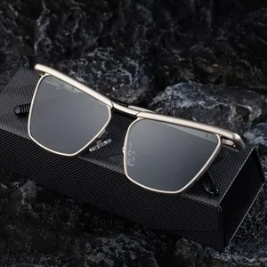 Men's fashion cat eye sunglasses with metal frame on textured rock background