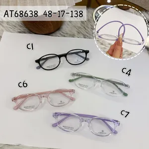 Detailoverzicht van ovale brilmonturen in diverse kleuren met maataanduiding 48-17-138