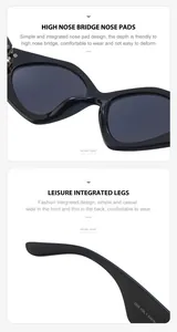 Detail view of high nose bridge and integrated legs on black oversized sunglasses