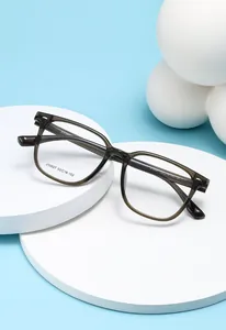 Macro detail of J10027 square TR eyeglasses frame with size markings on white stand