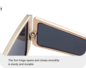 Macro detail of the smooth metal hinge and sturdy screw on gold punk sunglasses