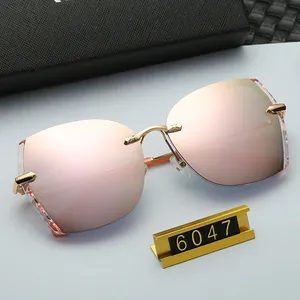 Fashionable rimless polarized sunglasses with rose gold lenses and metallic frames