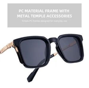 Détail de lunettes de soleil carrées polarisées avec monture noire et charnières dorées
