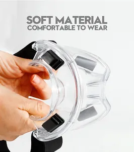 Close-up showing the soft flexible material and transparency of the safety goggles