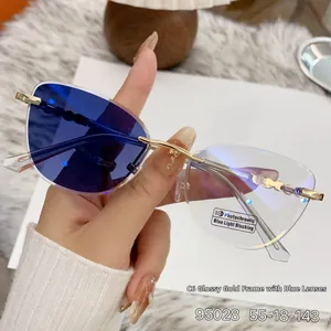 Macro shot of rimless cat-eye photochromic lenses showing blue tint transition effect