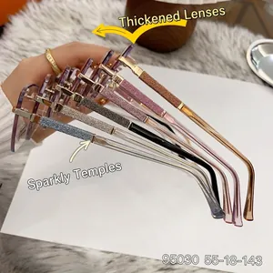 Close-up of rimless sunglasses with thick lenses and glittered temples model 95030