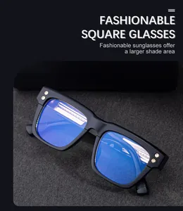 Detail of square sunglasses with black frame, blue coated lenses and gold metal accents