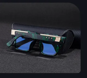 Detail of green marble square sunglasses with gold hinges and blue reflective lenses