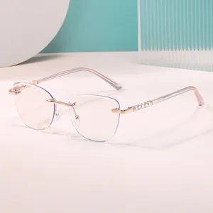 Fashionable rimless cat eye sunglasses with rose gold frame and rhinestone crystal temples