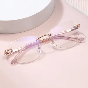 2025 trendy frameless cat-eye sunglasses with rose gold wavy metal temples for women