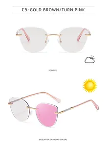 Detail of cat eye photochromic sunglasses with gold metal frame and sparkling rhinestones
