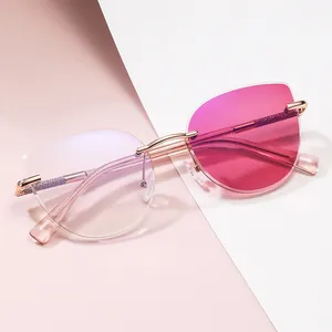 Fashion cat eye rimless sunglasses with pink gradient lenses and rose gold metal frames