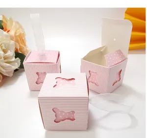 Detailed view of pink hollow bear gift boxes with ribbons for baby showers and parties
