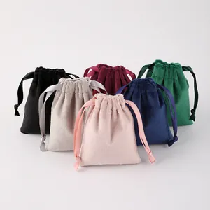Velvet drawstring jewelry pouches in multiple colors with elegant satin ribbons