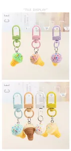 Detailed tile display of colorful resin ice cream cone keychains in various candy colors