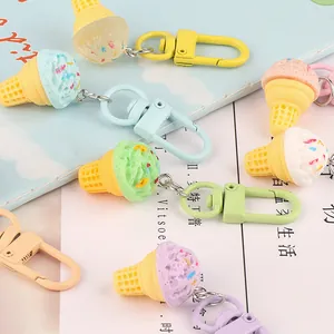 Colorful resin ice cream cone keychains with macaron colors and lobster clasps