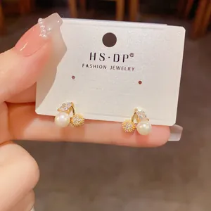 Exquisite cherry stud earrings with white pearls and sparkling leaf-shaped zirconias