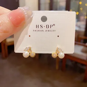 Exquisite cherry stud earrings with pearl, crystal zirconia and gold finish detail