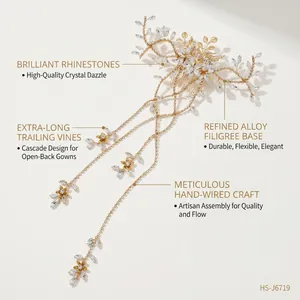 Detail of bridal hair comb featuring extra-long crystal trailing vines in gold finish