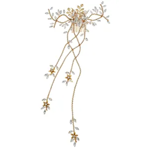 Elegant gold bridal hair comb with rhinestone flowers and long dangling tassels