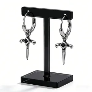Gothic silver dagger hoop earrings with black stone inlay on a professional T-bar stand