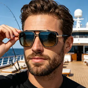 Close-up of premium men square polarized sunglasses with black and gold frame on yacht