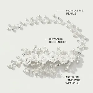 Detailed view of handmade bridal hair comb with white resin roses and glossy pearls