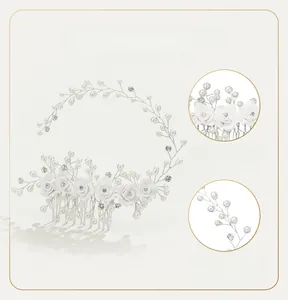 Detailed macro view of handmade ceramic flower hair comb with pearls and rhinestones