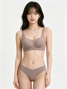 Detail of seamless earth-tone wireless bra and matching panty set on a female model