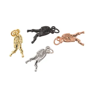 Set of four 24K gold plated zombie dance pendants in gold, silver, black, and rose gold finishes