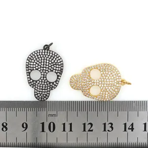 24K gold plated skull pendants with micro-paved zircons measuring 25mm to 30mm