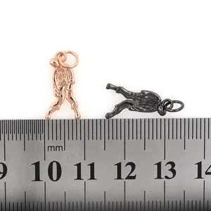 24K gold plated zombie pendant in rose gold and gun black finish with sizing ruler