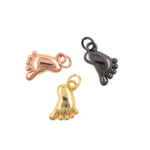 Three gold-plated baby feet charms for DIY jewelry making in various metallic finishes