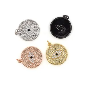 Evil Eye pendants in gold and silver finish with zircon inlay and hammered texture