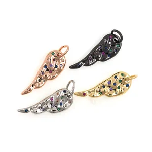 Four-color wing pendants in gold and silver with vibrant multicolored zircon crystals