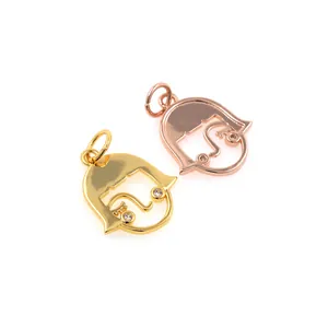 Abstract girl face pendants in gold and rose gold finish with zircon stone eyes