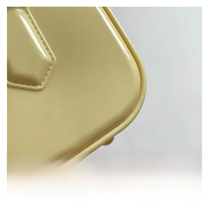 Detail of premium pale yellow leather shoulder bag showing smooth corners and stitching