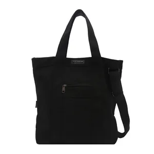 Retro zwarte canvas shopper met FASHION INSTINCT label en verstelbare schouderband