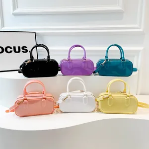 Mini candy-colored PVC jelly pillow bags in six vibrant colors with gold hardware