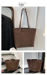 Detail view of coffee leopard print tote bag with durable PU leather handles and stitching