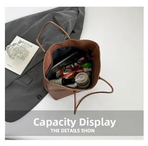 Macro shot showing large storage capacity of the brown tote bag with daily essentials