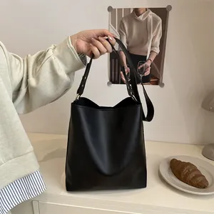 Sac seau minimaliste en cuir PU mat noir avec poignée pour le quotidien des femmes