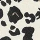 Gros plan sur la texture du tissu à imprimé léopard d'une pochette moderne chic