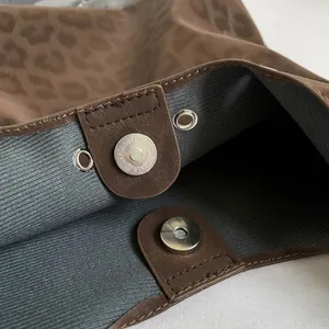 Retro leopard print tote bag featuring premium suede fabric and secure dual magnetic closures